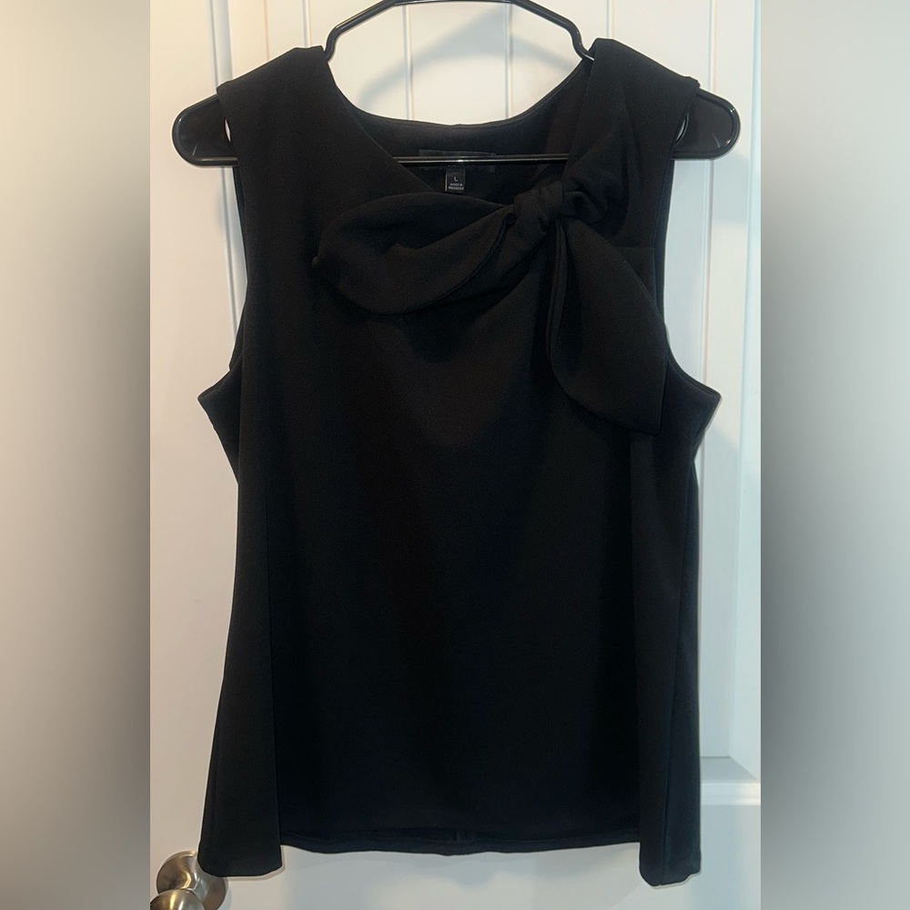 Black sleeveless blouse